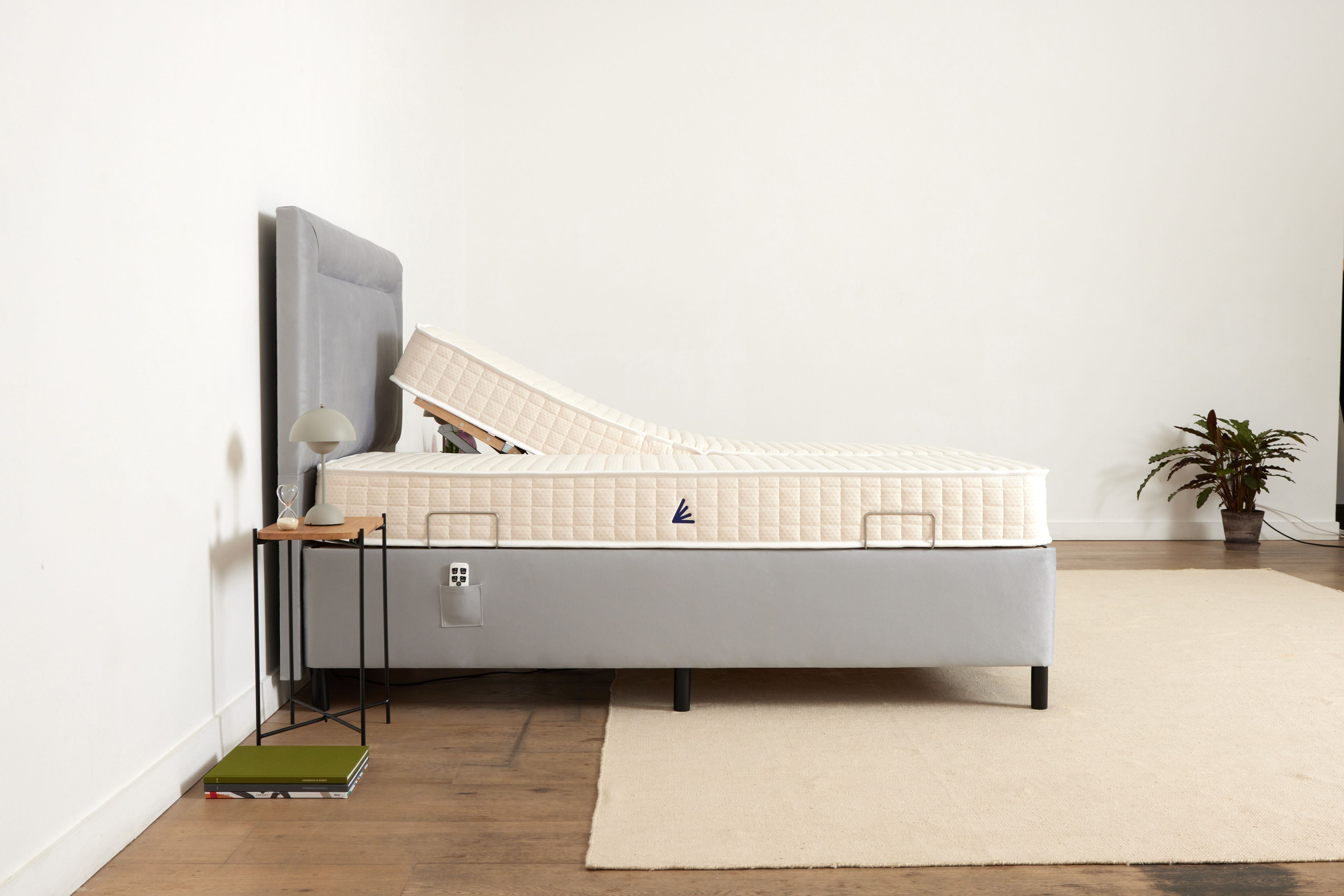 Double adjustable outlet bed frame